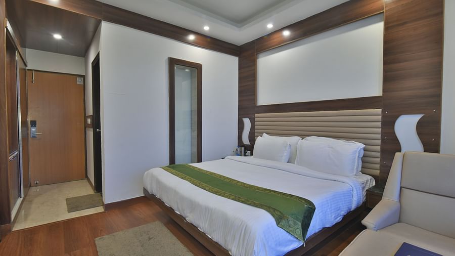 A view of the large bed in the Premium Room at DLS Highland Resort and Spa, Mussoorie.